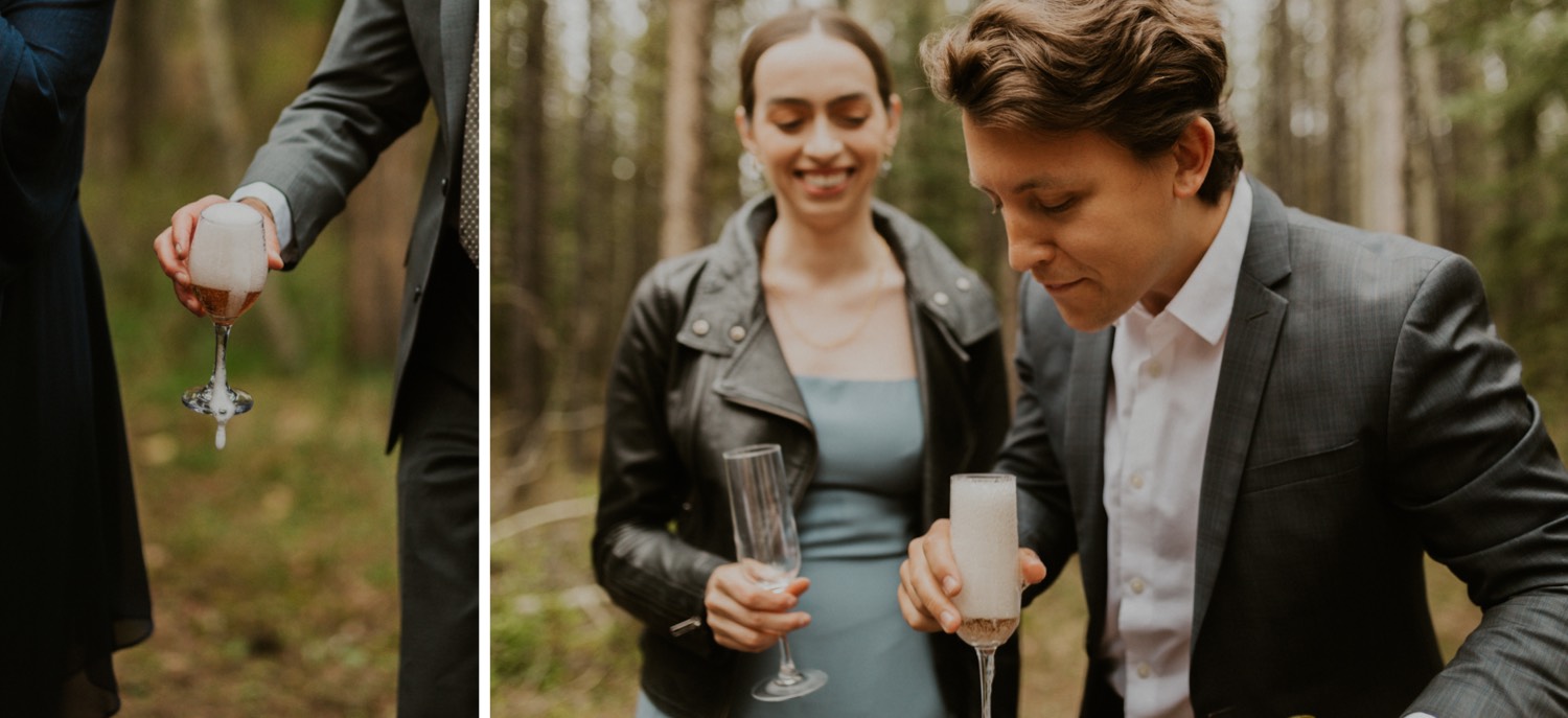 A Kananaskis Lake Elopement in the beautiful Canadian Rockies photo of outdoor reception in the forest with toasts and laughs