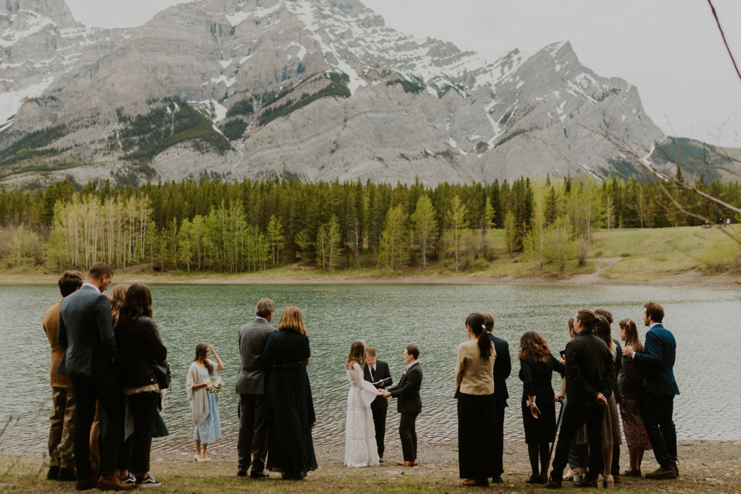 A Kananaskis Lake Elopement in the beautiful Canadian Rockies photo of ceremony in front of the lake