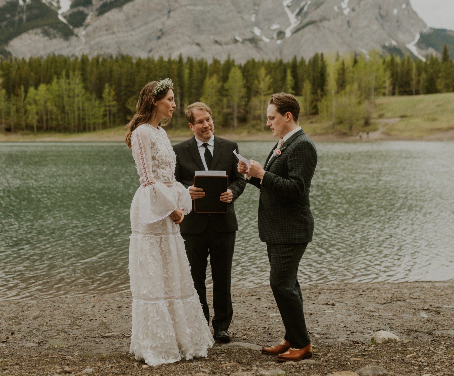 A Kananaskis Lake Elopement in the beautiful Canadian Rockies photo of ceremony in front of the lake