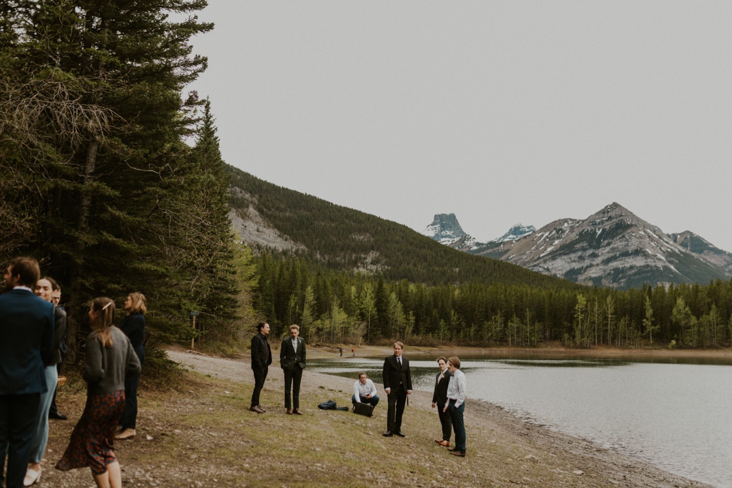 A Kananaskis Lake Elopement in the beautiful Canadian Rockies photo of family walking to ceremony spot