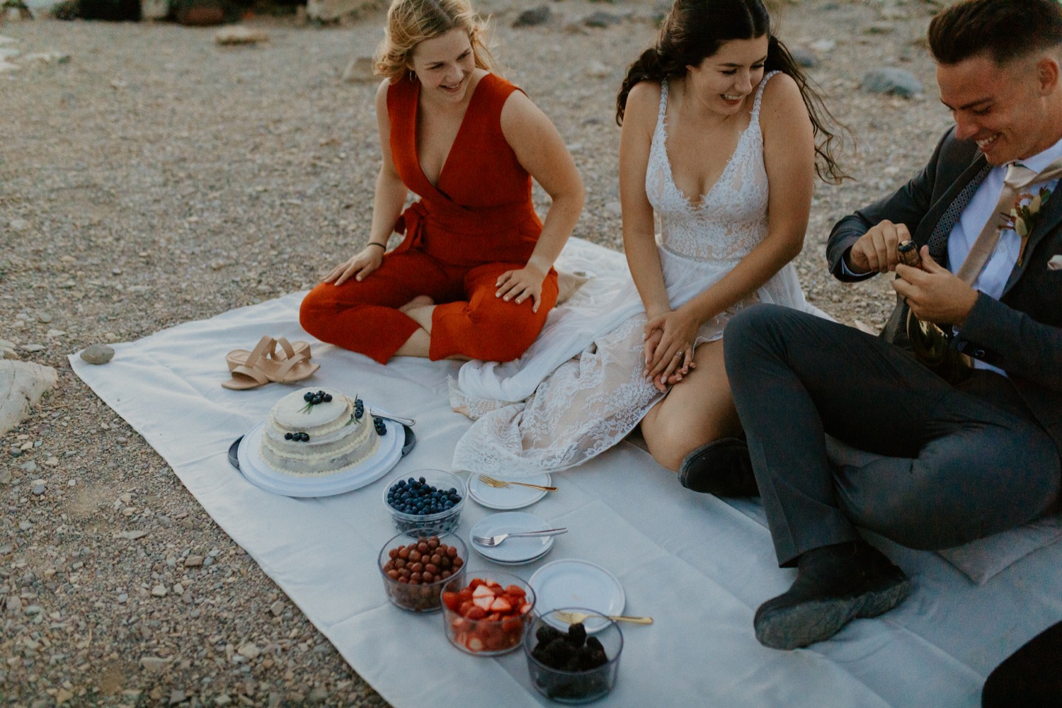 Waterton Wedding Adventurous Mountain Elopement style in the beautiful Canadian Rocky Mountains picnic on a mountain top after the elopement ceremony