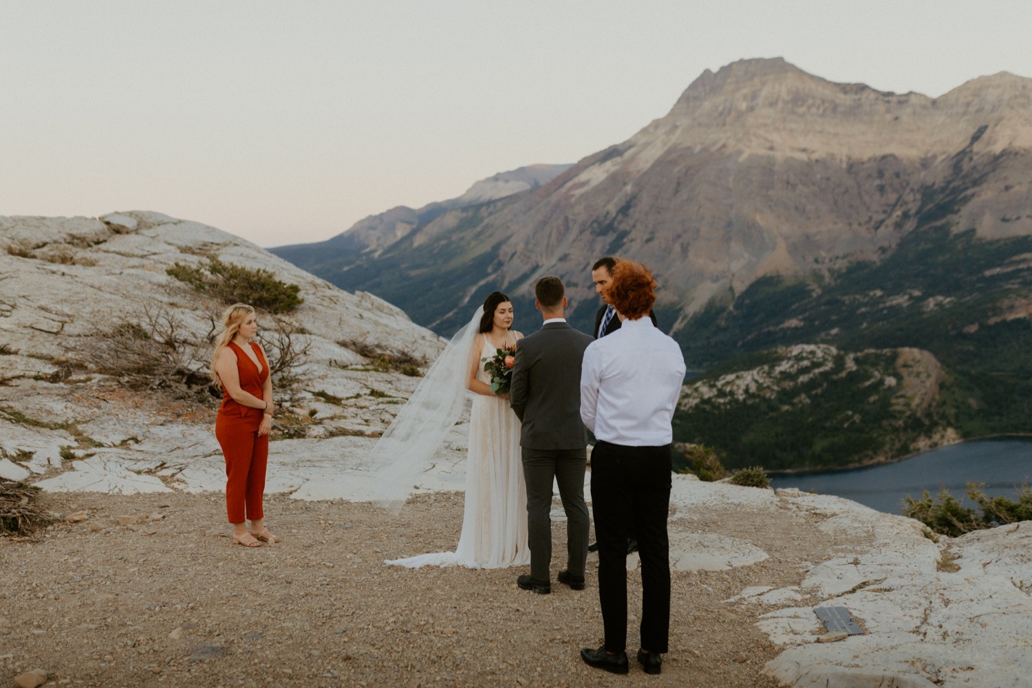 Waterton Wedding Adventurous Mountain Elopement style in the beautiful Canadian Rocky Mountains ceremony at the mountain top with close friends and officiant