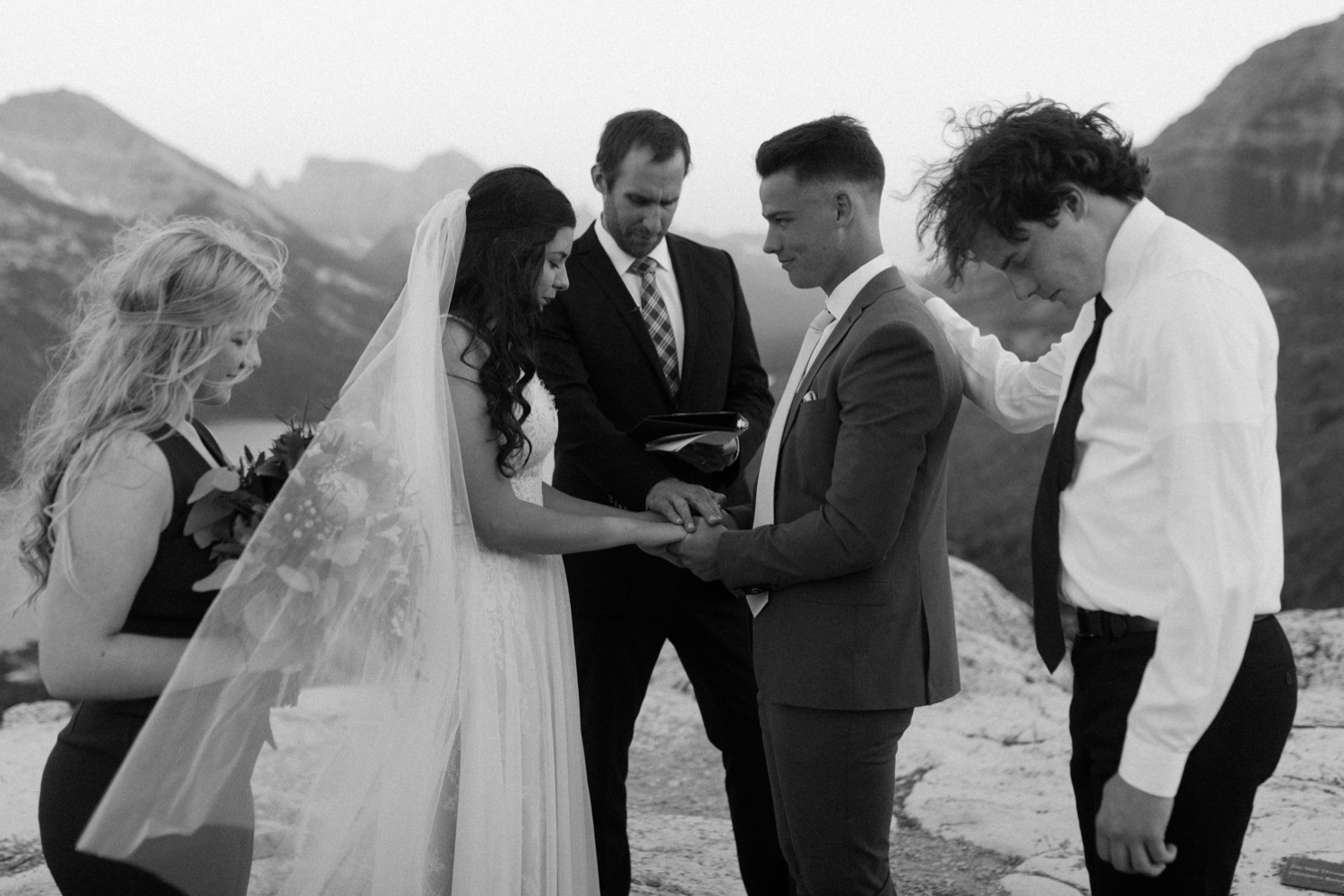 Waterton Wedding Adventurous Mountain Elopement style in the beautiful Canadian Rocky Mountains ceremony at the mountain top with close friends and officiant