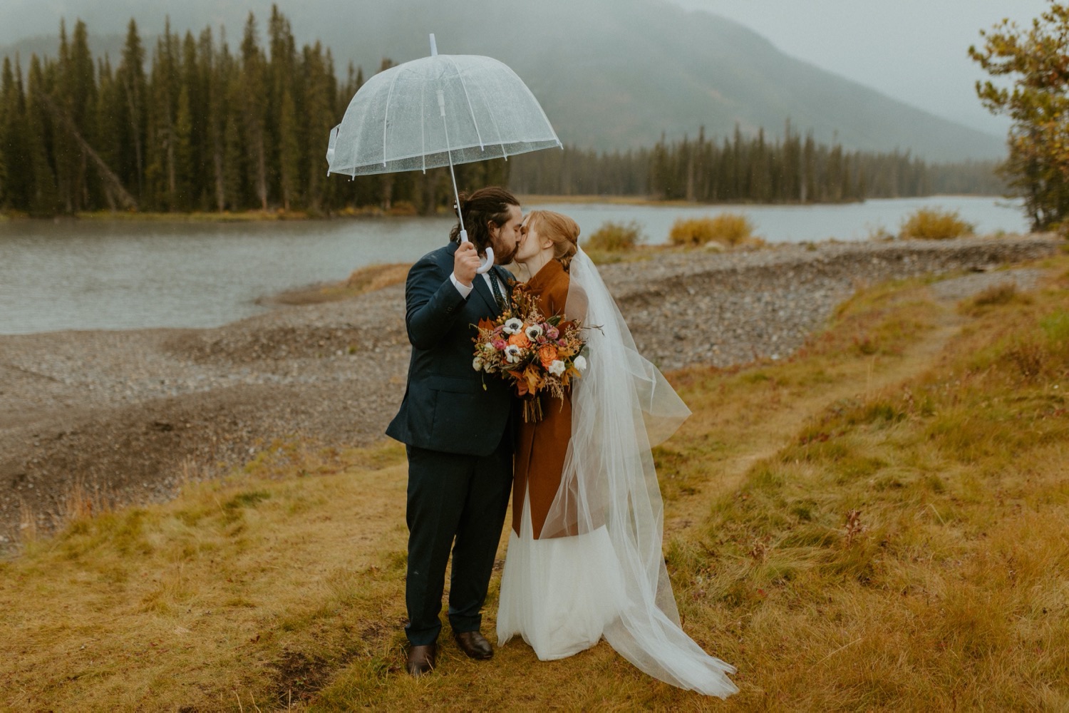 Banff Elopement, Banff Elopement with Family present, Small wedding in Banff, Banff small outdoor wedding, Banff small wedding with friends and family present, how to elope with family present, family elopement, Banff summer elopement, Banff fall wedding, Ceremony in Canmore, Wedding Ceremony at Sprays Lake in Canmore, How to get married in Banff, How to get married in canmore, Banff wedding photographer, Banff Elopement Photographer, Wedding near Banff in Canmore